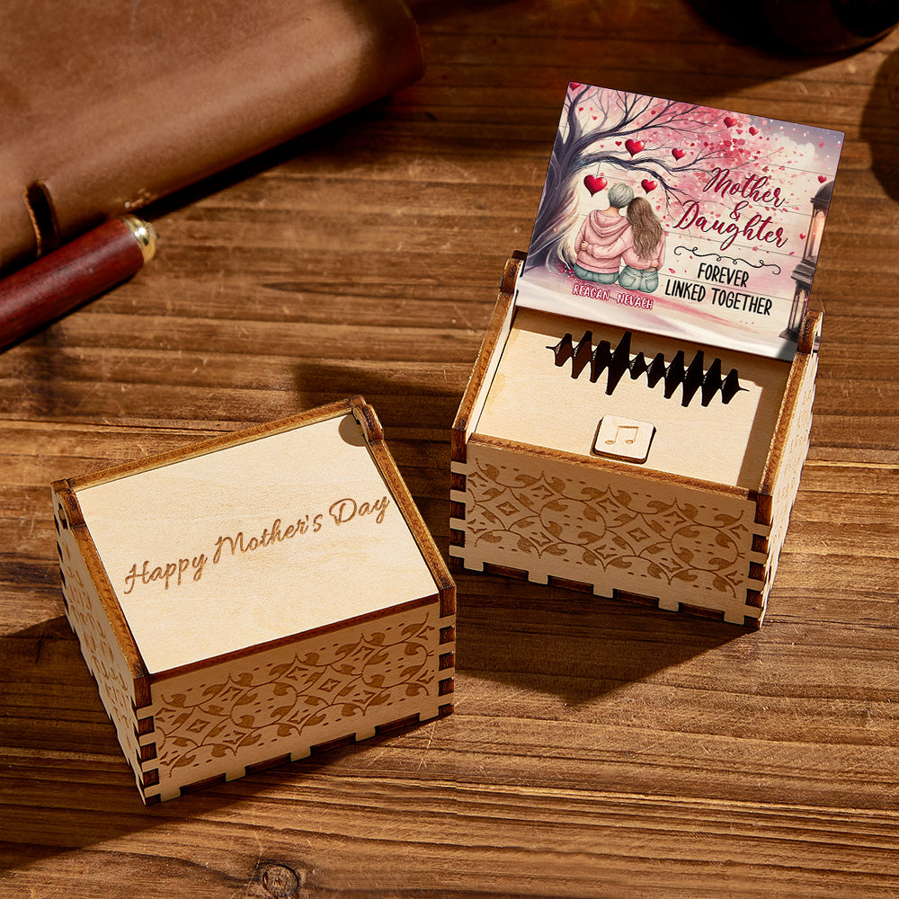 Personalized wooden music box with "Happy Mother's Day" engraving, a unique gift.