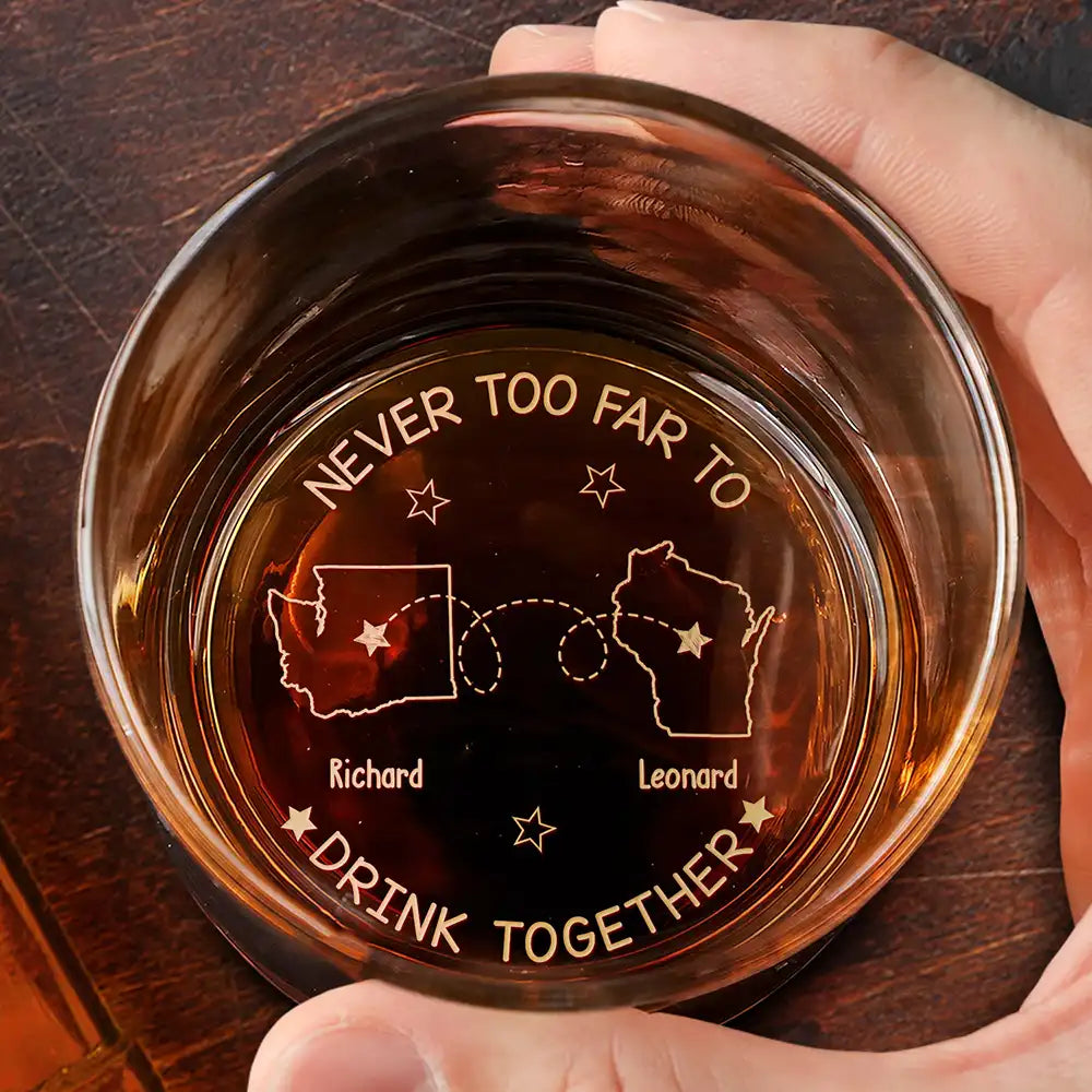 Personalized engraved whiskey glass with 'Never Too Far To Drink Together' design, perfect gift for friends