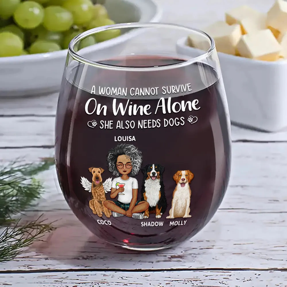 Dog mom wine glass with "A woman cannot survive on wine alone" quote and dog design