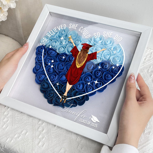 Graduation flower shadow box with "She believed she could so she did" message, MDF frame.