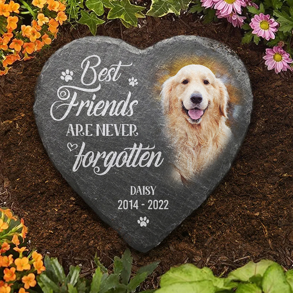 Heart-shaped pet memorial stone with golden retriever photo and 'Best Friends Never Forgotten' inscription.