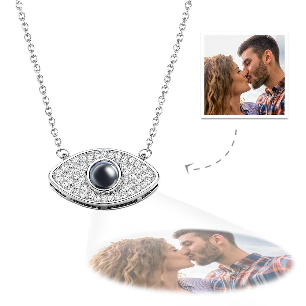 Evil eye projection necklace with custom photo for women.  Silver pendant with crystal details. Ideal gift for anniversary.