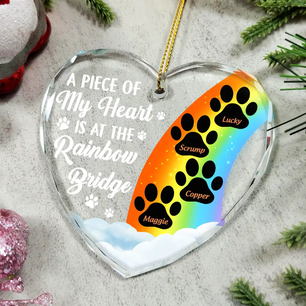 Personalized Rainbow Bridge Pet Memorial Ornament with Paw Prints. Heart-shaped glass with rainbow design.