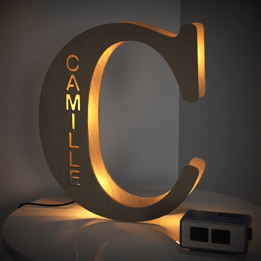 Personalized wooden letter 'C' night light with the name 'CAMILLE', 28CM tall, warm LED glow, home decor.